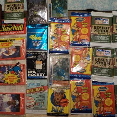 Over 25 un-opened Collectors cards/ Batman, 1990 Baseball, NHL Hockey, WWF.