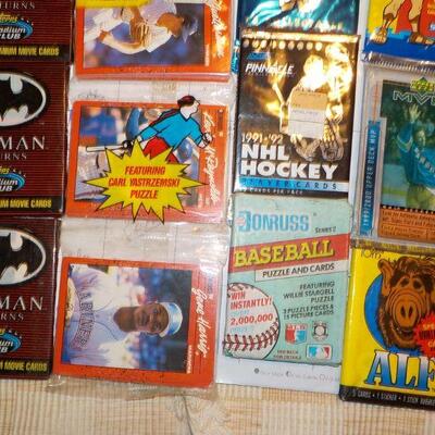 Over 25 un-opened Collectors cards/ Batman, 1990 Baseball, NHL Hockey, WWF.