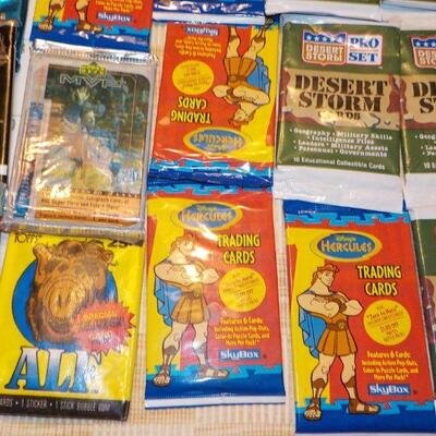 Over 25 un-opened Collectors cards/ Batman, 1990 Baseball, NHL Hockey, WWF.