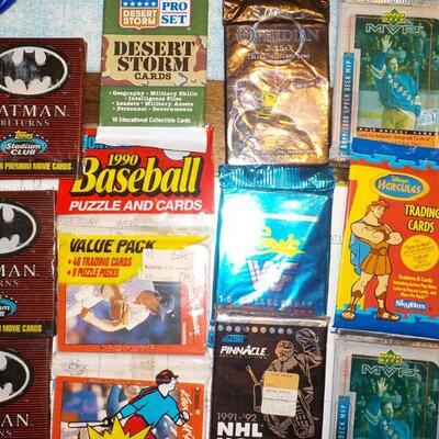 Over 25 un-opened Collectors cards/ Batman, 1990 Baseball, NHL Hockey, WWF.