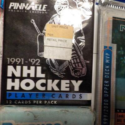 Over 25 un-opened Collectors cards/ Batman, 1990 Baseball, NHL Hockey, WWF.
