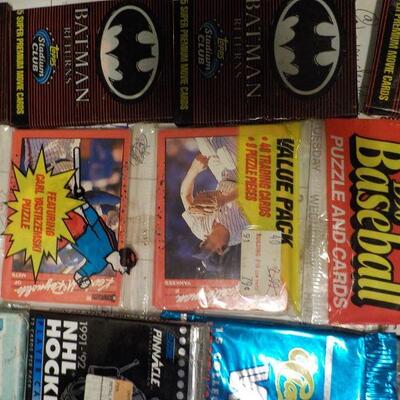 Over 25 un-opened Collectors cards/ Batman, 1990 Baseball, NHL Hockey, WWF.