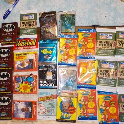 Over 25 un-opened Collectors cards/ Batman, 1990 Baseball, NHL Hockey, WWF.