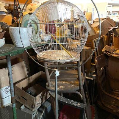 Round metal bird cage on stand 