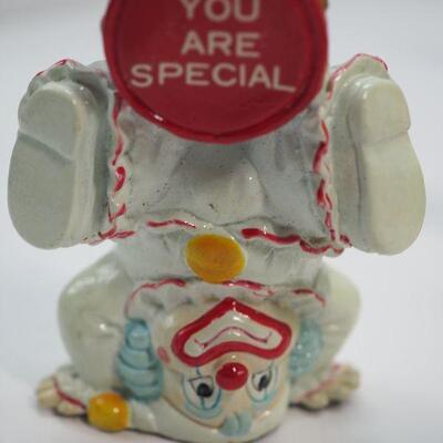 Lot 73  Handstand/ figurines