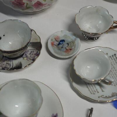 Lot 75 Fine bone chin,. mini cups, hand blown glass