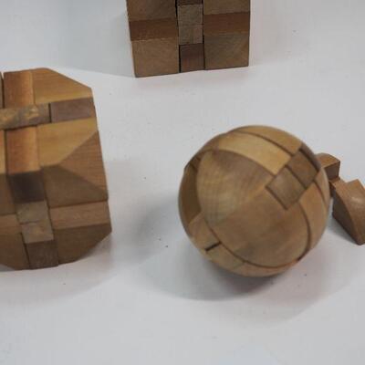 Lot 87 Wooden puzzles and Boxes