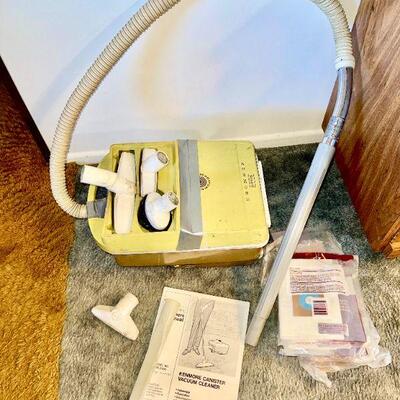 LOT 287  VINTAGE KENMORE CANISTER VACUUM & ATTACHMENTS