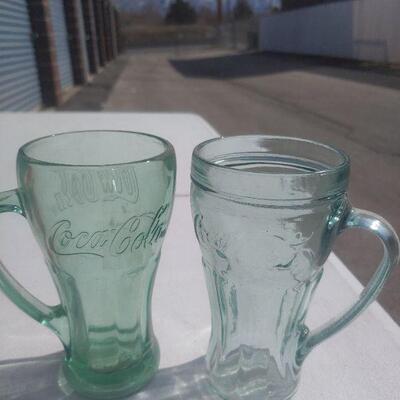Lot of Coca Cola glasses