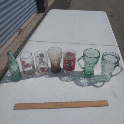 Lot of Coca Cola glasses