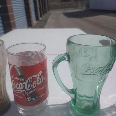 Lot of Coca Cola glasses
