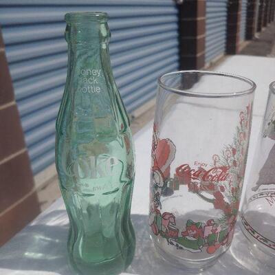 Lot of Coca Cola glasses