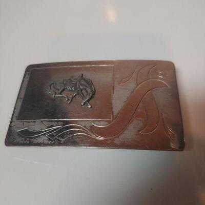 Nickel and silver belt buckle