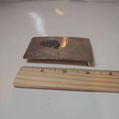 Nickel and silver belt buckle