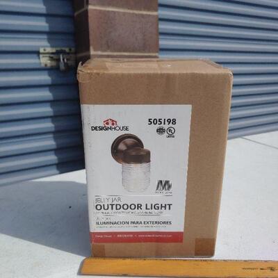 New in box outdoor light