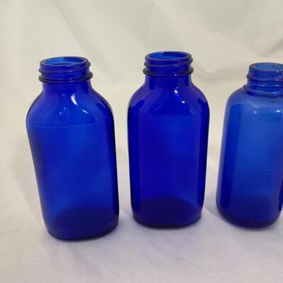 .238. VINTAGE | Five Cobalt Blue Bottles | Milk of Magnesia