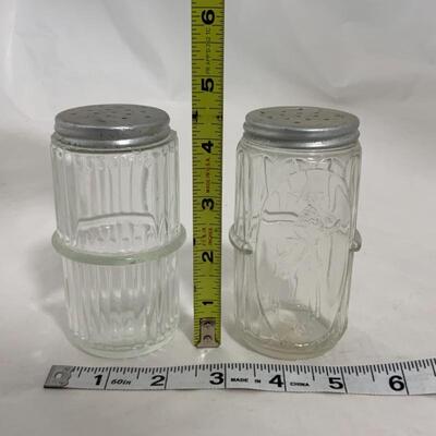 .265. VINTAGE | Two Clear Mis-Matched Shakers | Hoosier | Lady