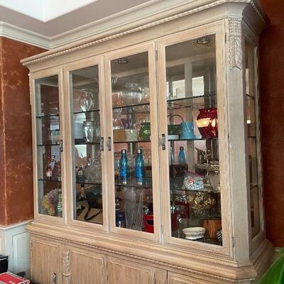 Beautiful China cabinet with glass shelves and tons of storage