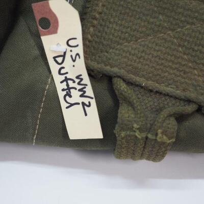 Lot 103 Military Duffel bag and 6 pocket knives, 1 vintage Western cap gun