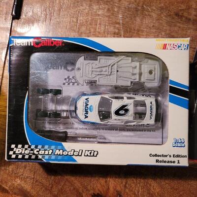 Nascar collectors tin and mini model kit
