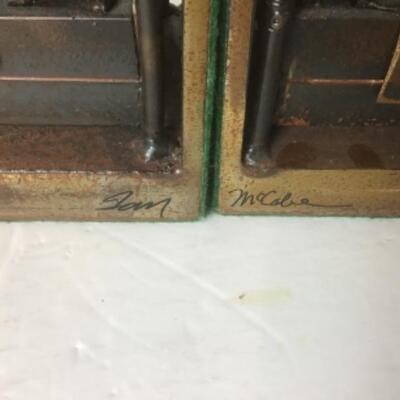 Q - 1249. Signed by  Thomas J. McCabe,  Scrap Metal Bookends