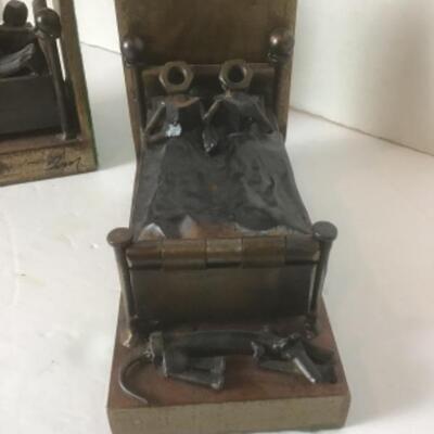 Q - 1249. Signed by  Thomas J. McCabe,  Scrap Metal Bookends