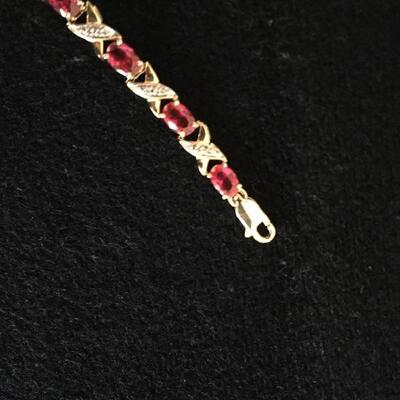 Sterling 7.5â€ Bracelet with 14 Rubies and Gold Wash