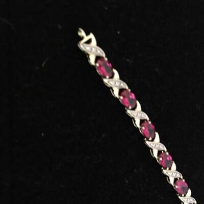 Sterling 7.5â€ Bracelet with 14 Rubies and Gold Wash