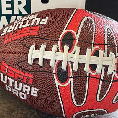 12: 2 Footballs and a Superbowl Sign