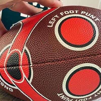 12: 2 Footballs and a Superbowl Sign