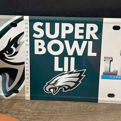 12: 2 Footballs and a Superbowl Sign