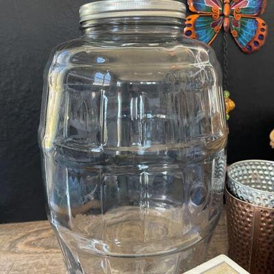 40: Large Glass Jug, Basket, and DÃ©cor