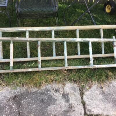 TWO VINTAGE WOODEN LADDERS