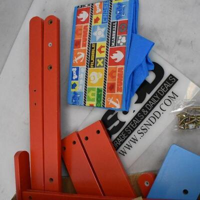 Paw Patrol Red/Blue Delta Children's Whiteboard Easel w/ Storage. Cracked shown