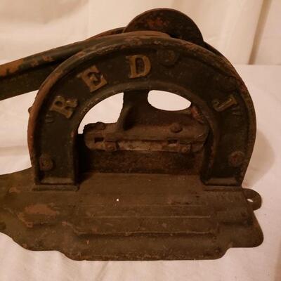 LOT #12. Antique cast-iron Griswold tobacco cutter