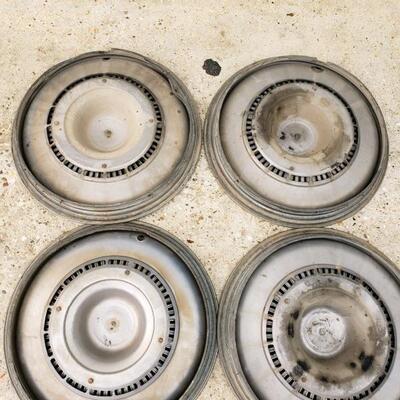 LOT #19. Set of four vintage Buick Electra hubcaps, 60s.