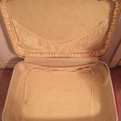LOT #20. Vintage red four piece suitcase/luggage set.