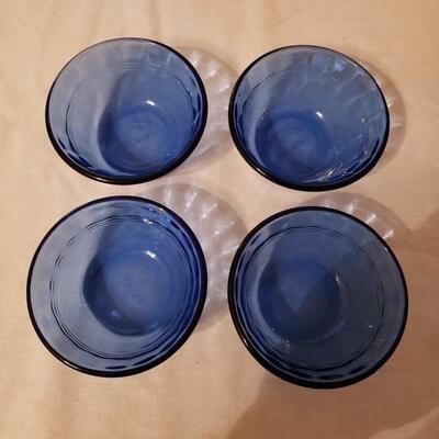 LOT #23. Cobalt Blue Lot B - depression glass square covered biscuit jar, 4 Pyrex custard cups, and blue & gold vase