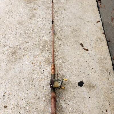 LOT #30. Antique Penn wooden rod and reel