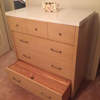 LOT #40. MCM beige chest of drawers with cedar lined bottom drawer
