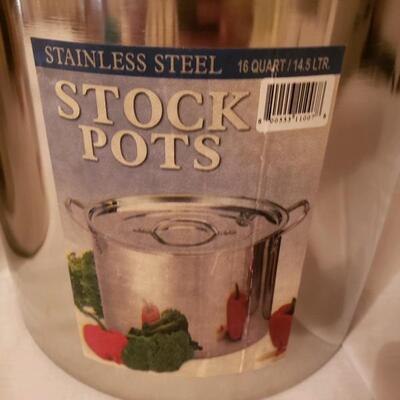 LOT #43. Lot of 2 large stainless steel stock pots with lids