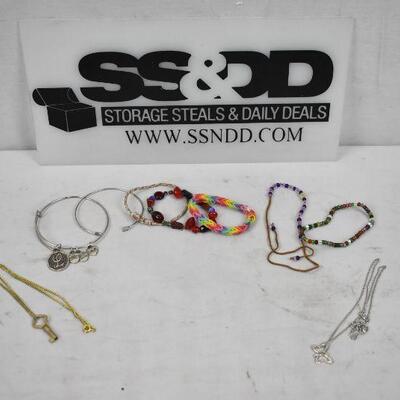 9pc Costume Jewelry: 2 Necklaces, 7 Bracelets