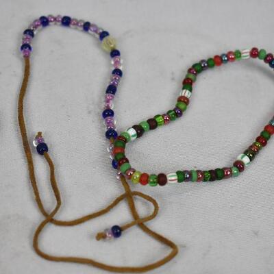 9pc Costume Jewelry: 2 Necklaces, 7 Bracelets