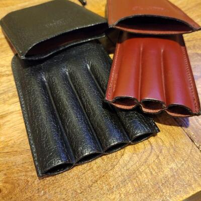 2 leather cigar holders