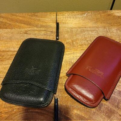 2 leather cigar holders
