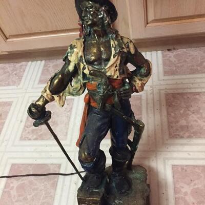 LOT #78. Antique bronze or brass pirate lamp