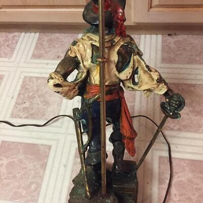 LOT #78. Antique bronze or brass pirate lamp