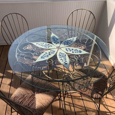 Lot 21 - Floral Glass Top Patio Table with Set of Four Chairs