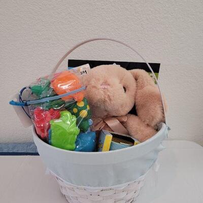 Lot 53: New Easter Basket with Plush Bunny, Mickey Activity Pad, Stickers, Slinky and Bath Toys