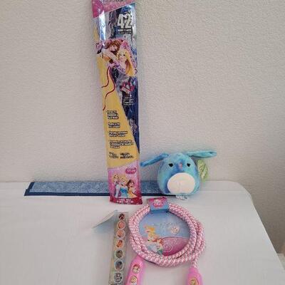 Lot 58: New Disney Princess Kite, Lip Gloss Rings, Jump Rope and Small Plush Bunny